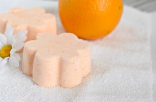 DIY Orange Bath Bombs - it's easy to make your own orange bath bombs with a few simple ingredients. They make perfect gifts, or you can keep them for yourself!