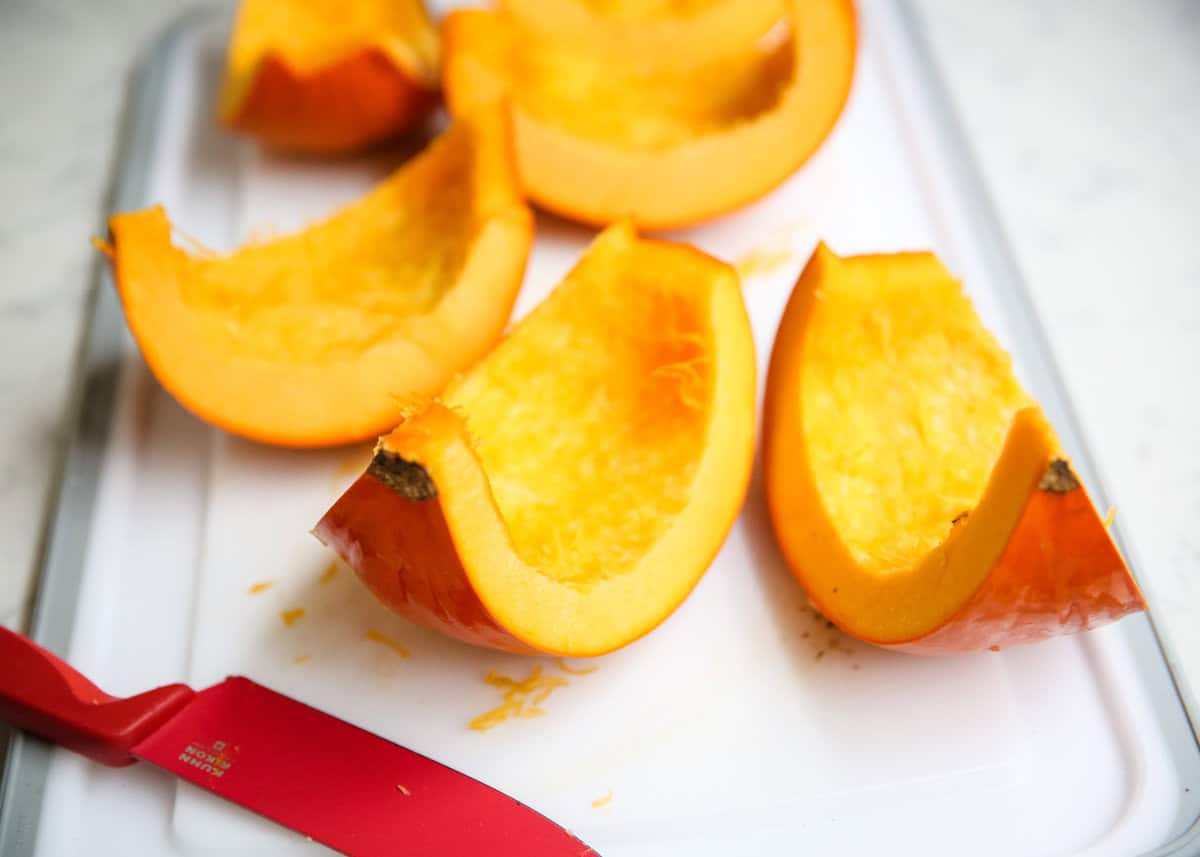 A pumpkin sliced for baking.