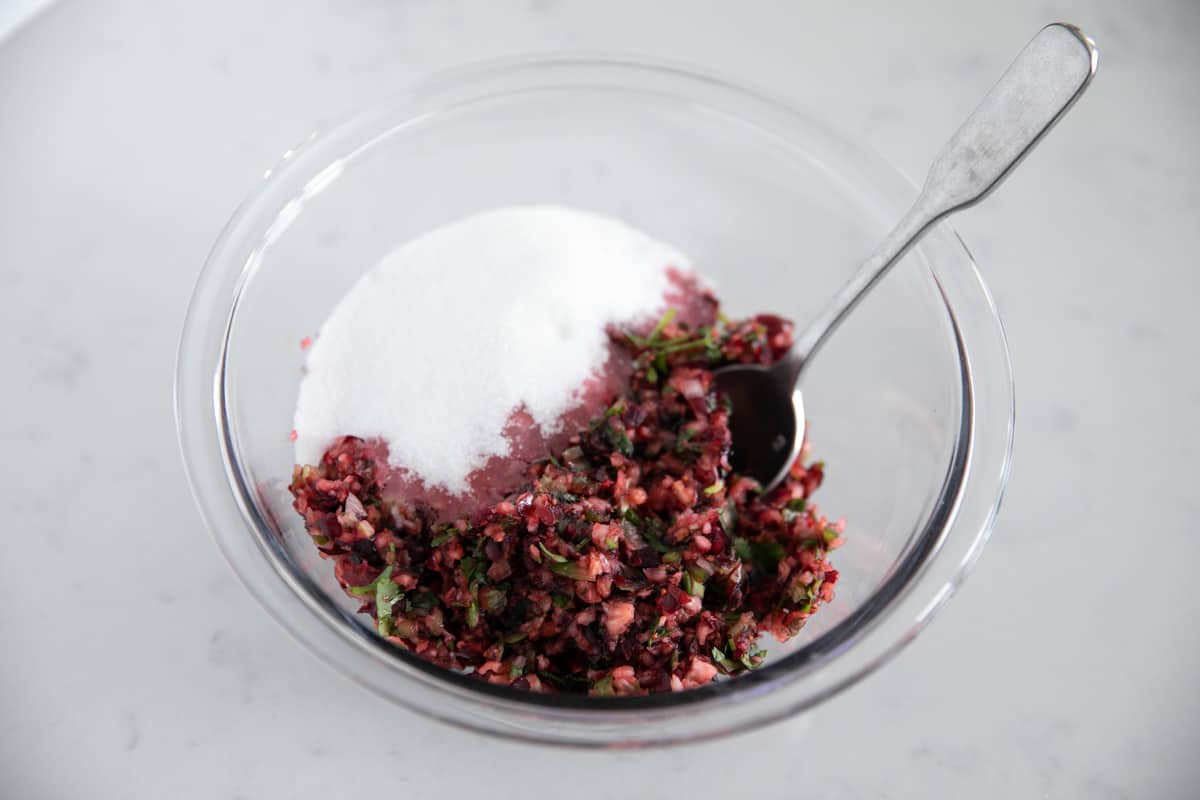 Cranberry salsa and sugar in a bowl.