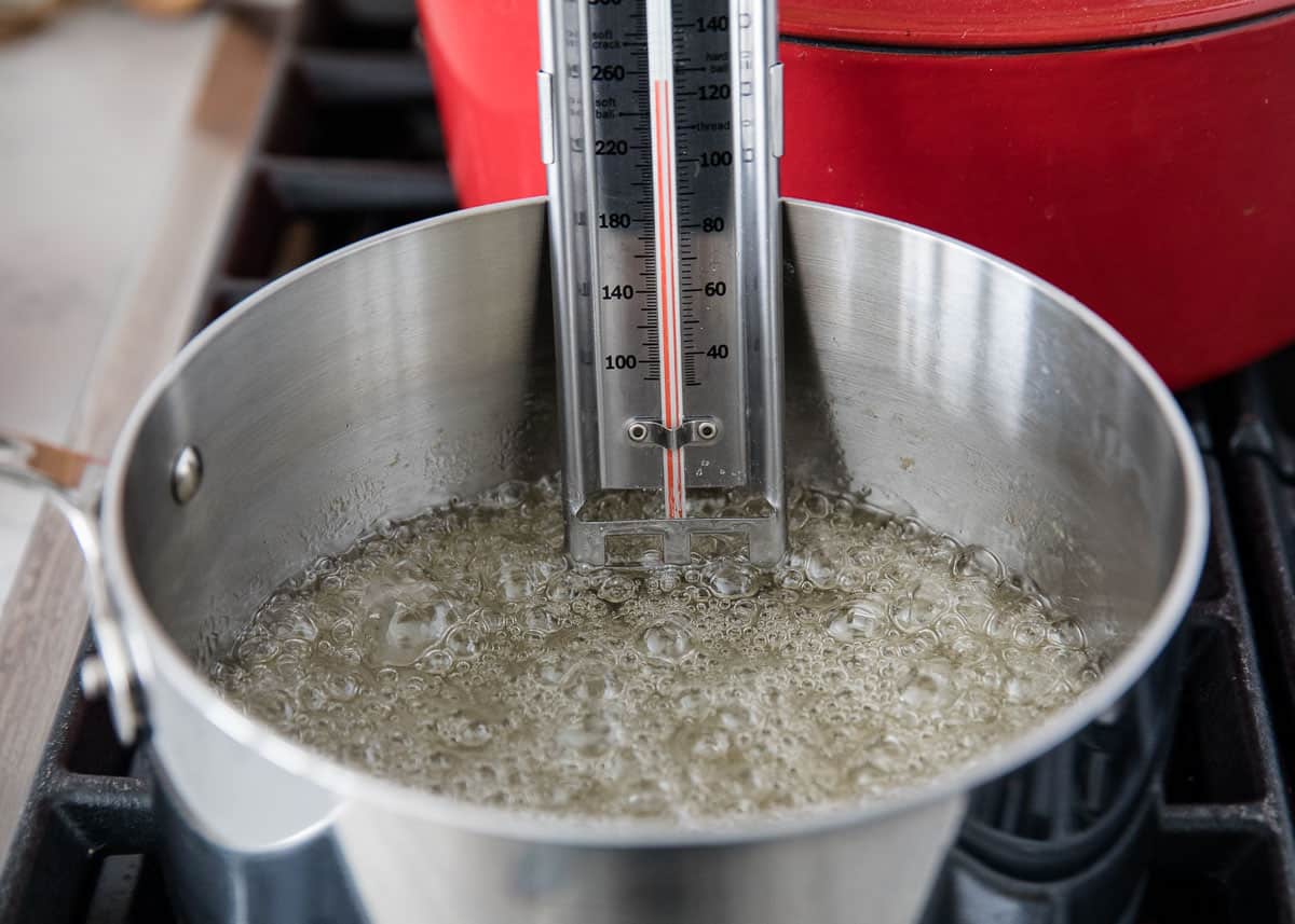 Boiling sugar and corn syrup.