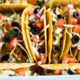 Ground beef tacos in a baking dish for a taco Tuesday dinner idea.