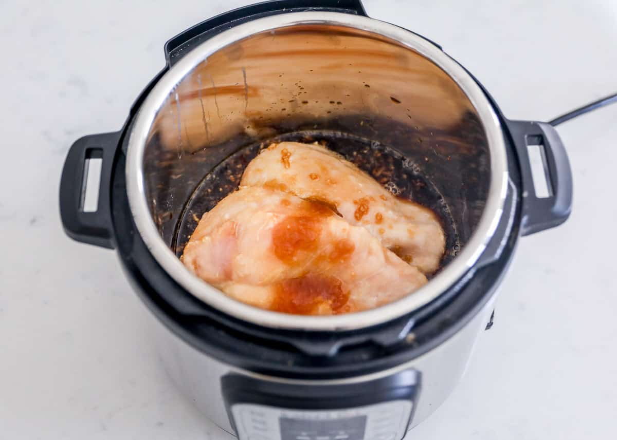 Chicken and teriyaki sauce in instant pot.