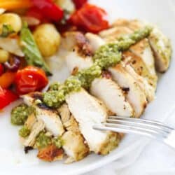 sliced pesto chicken on plate