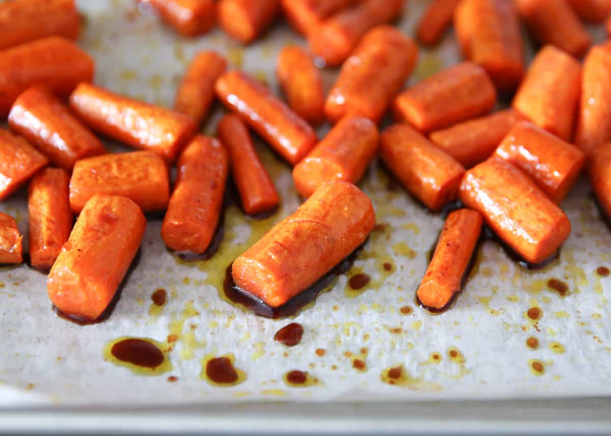 Balsamic roasted carrots on baking sheet.