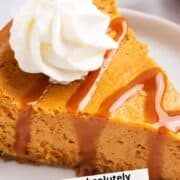 A slice of pumpkin cheesecake on a plate with a review.