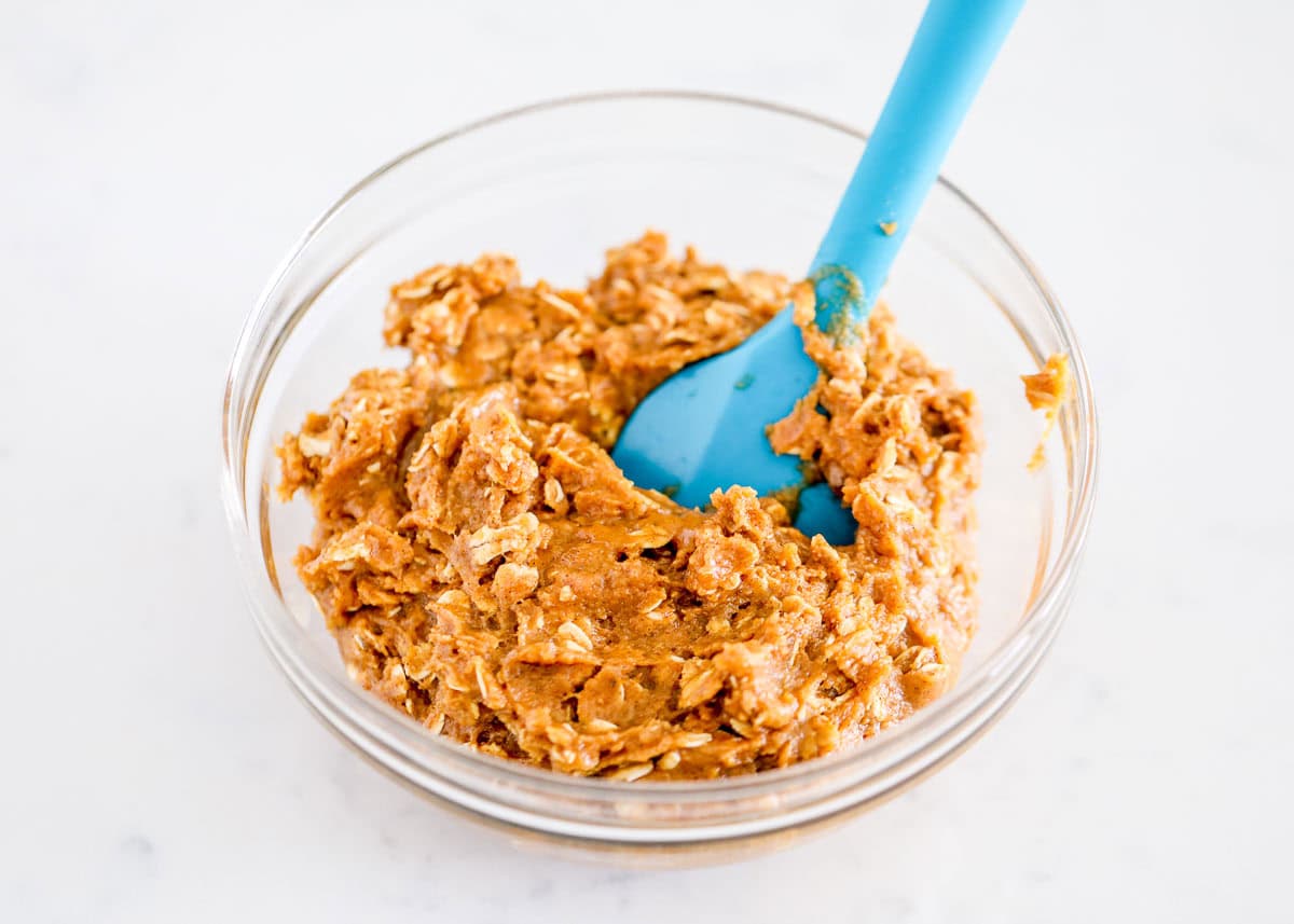 Making pumpkin oatmeal cookie dough batter.