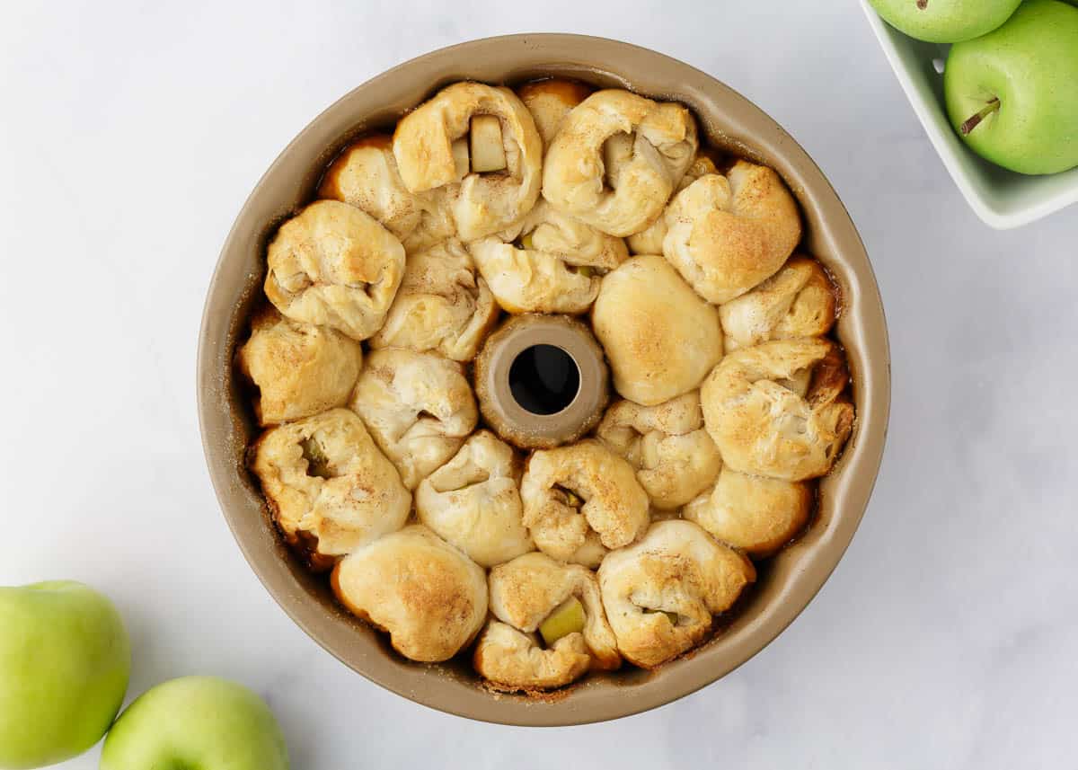 Baked caramel apple monkey bread still in pan.