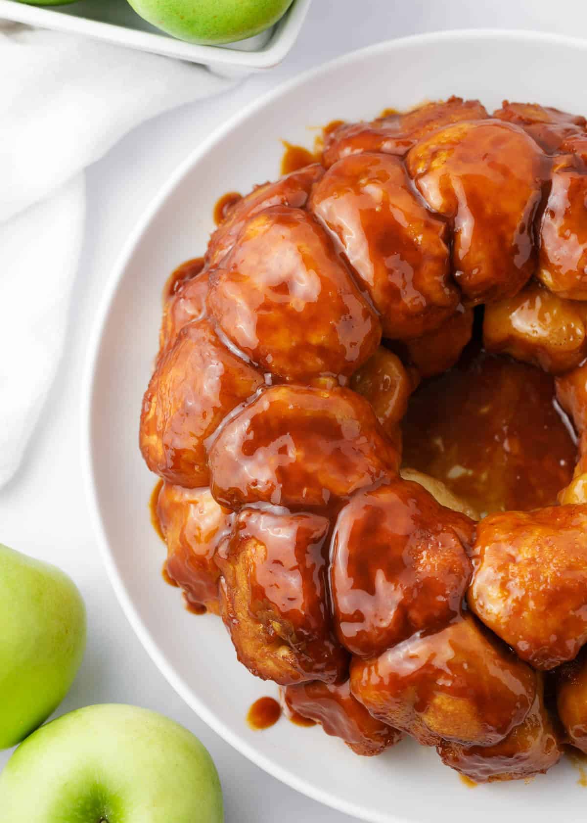 Apple monkey bread on a white plate.