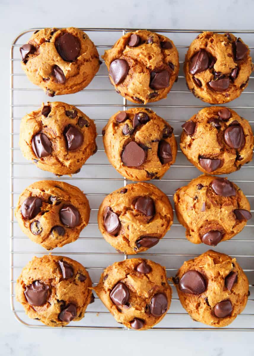 Pumpkin cookies with cake mix on a wire rack.