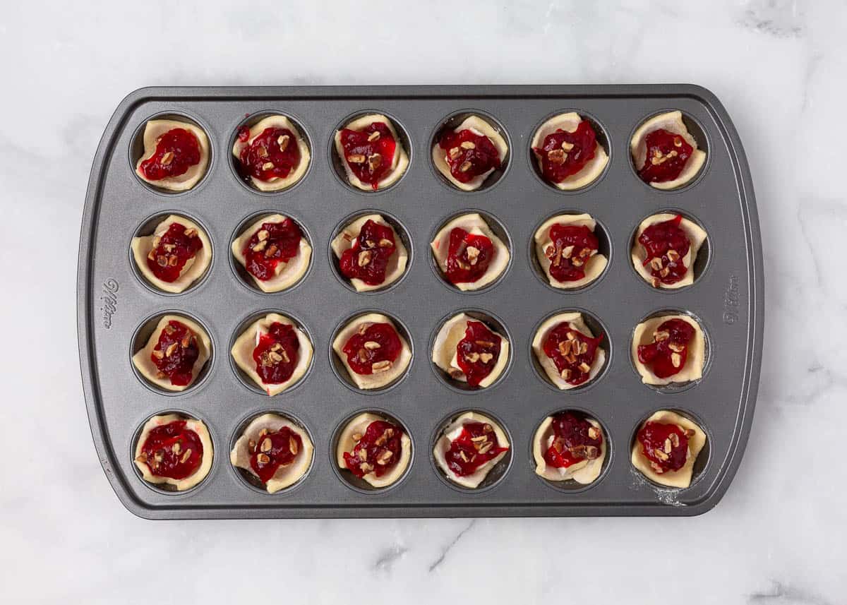 Unbaked cranberry brie bites.