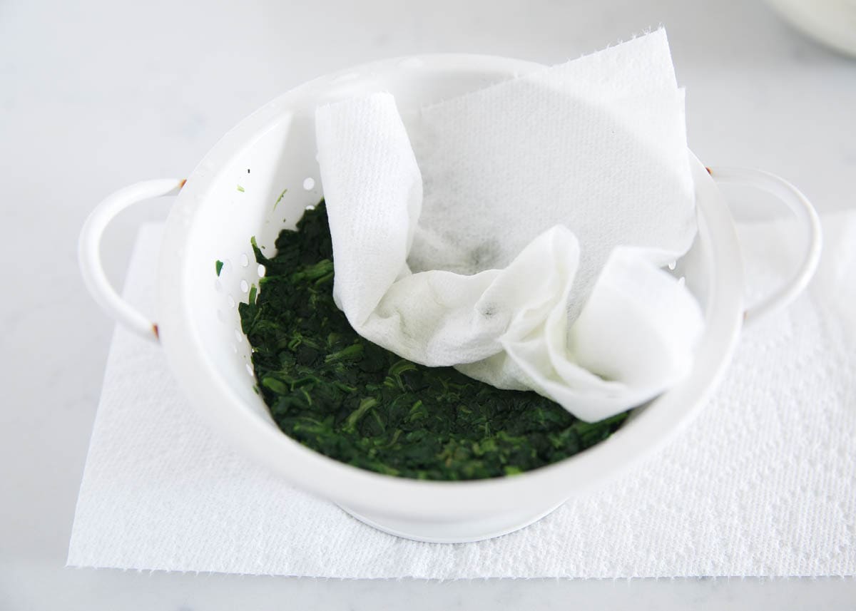 Spinach in a colander. 