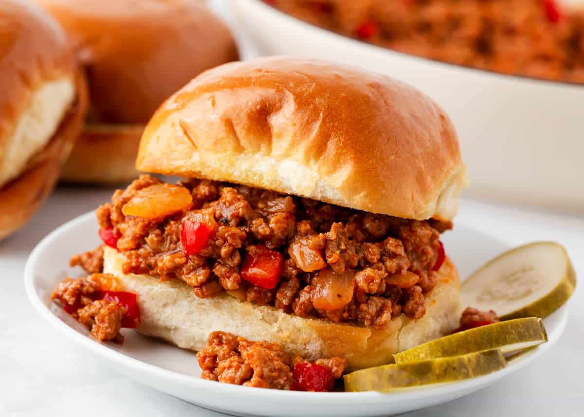 Turkey sloppy joe on a white plate.