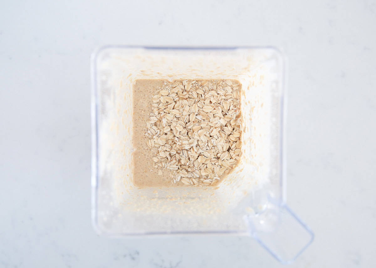 Oats and liquid ingredients in a blender.