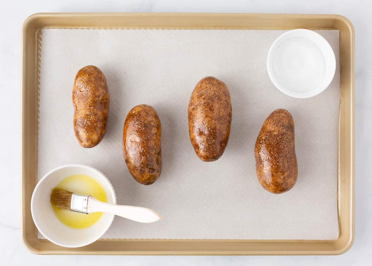 Potatoes on a baking sheet.