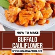 Buffalo cauliflower on a plate with celery and carrots plus dipping sauce.