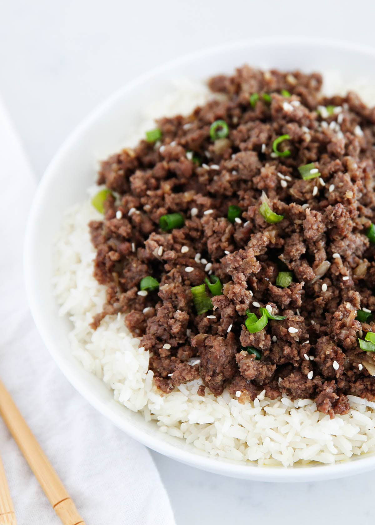 An easy ground beef recipe with Korean flavor served over rice.