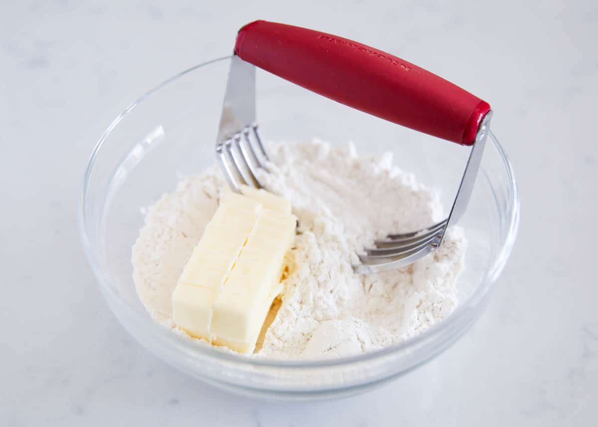 Making dough for a pie crust.