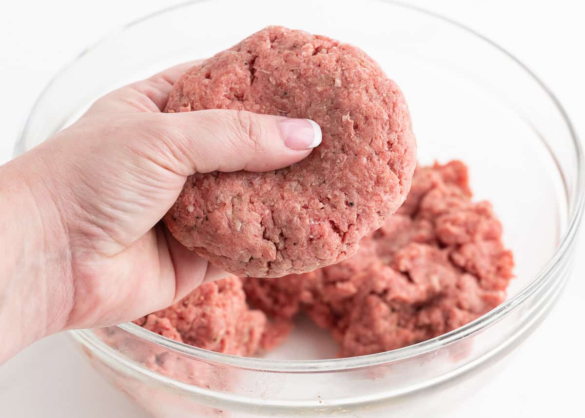 Showing how to indent a burger patty.