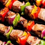 Grilled steak kabobs on a skewers.