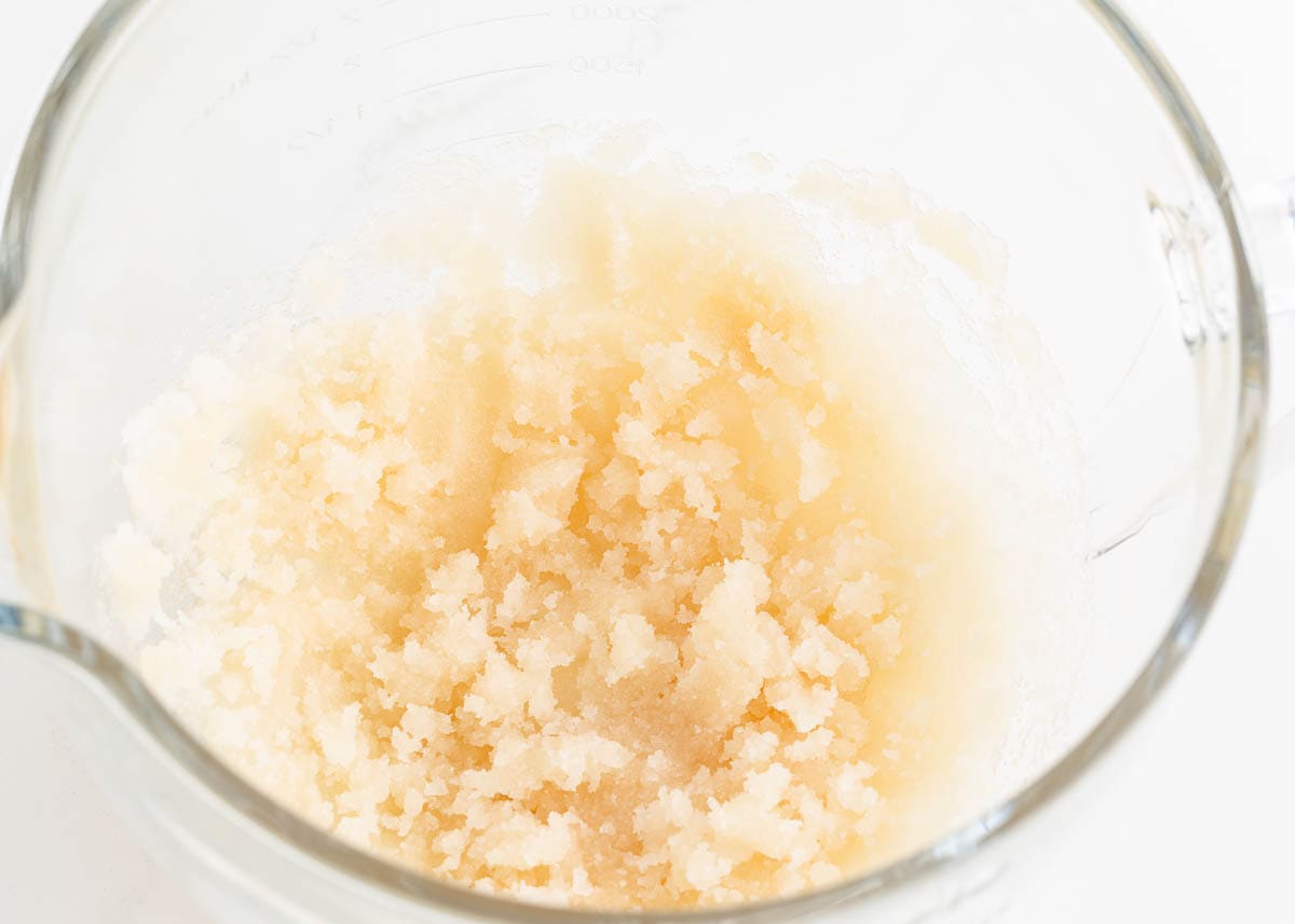 Creamed sugar, oil and vanilla in a mixing bowl.