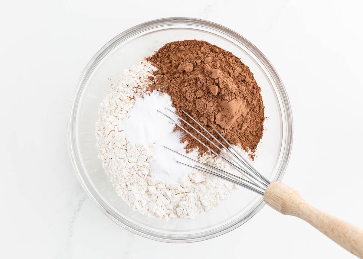 Flour, cocoa powder, baking soda and salt in a bowl with whisk.