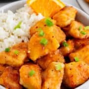 Orange Chicken in a bowl with rice.