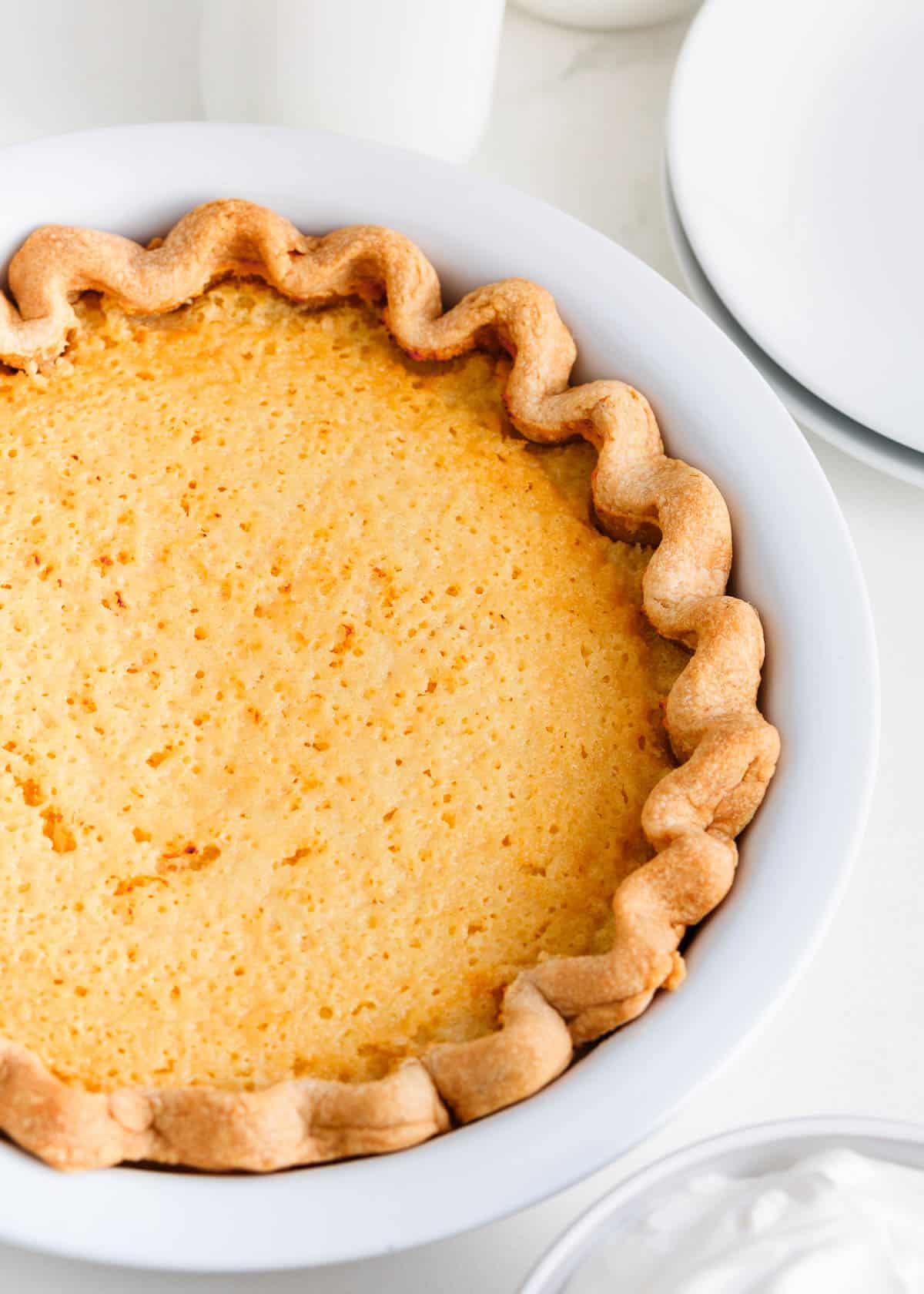 Buttermilk pie in a pie pan.