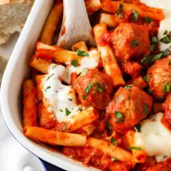 Spoonful on baked ziti with meatballs.