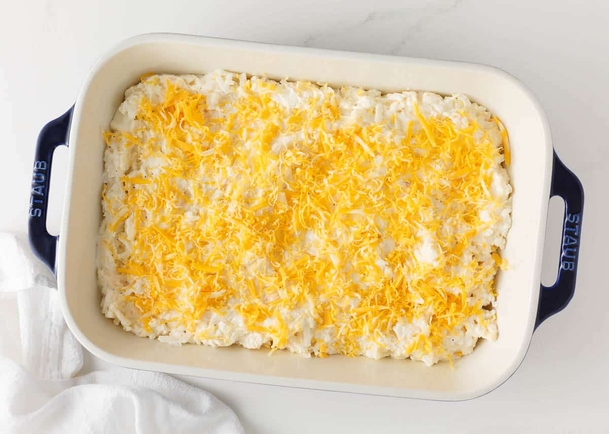 Assembled unbaked hash brown casserole.