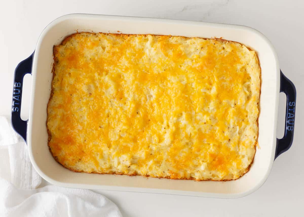 Hashbrown casserole in a baking dish.