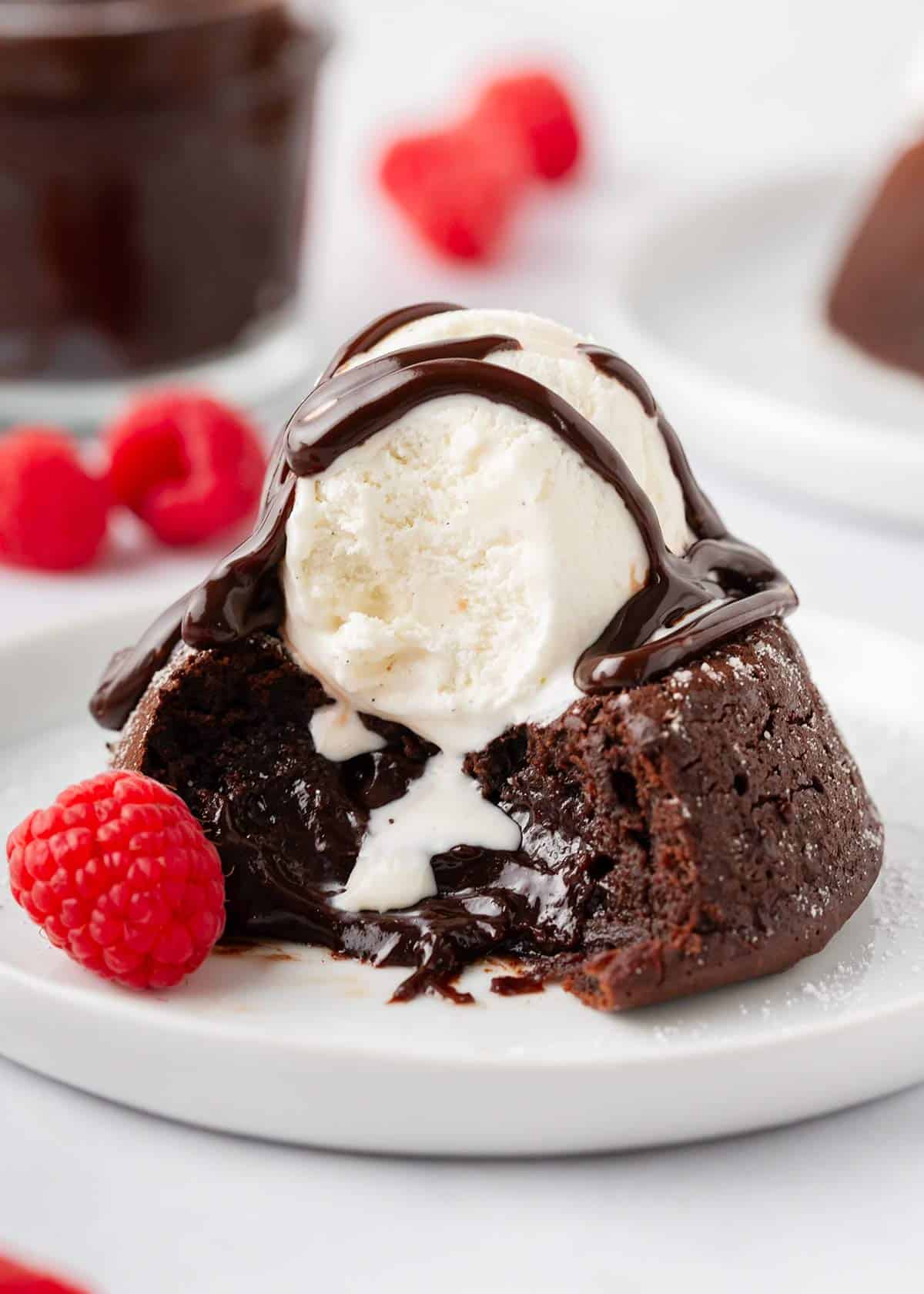 Chocolate lava cake with ice cream and hot fudge on top.