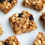 Oatmeal breakfast bars cut into pieces on the counter.