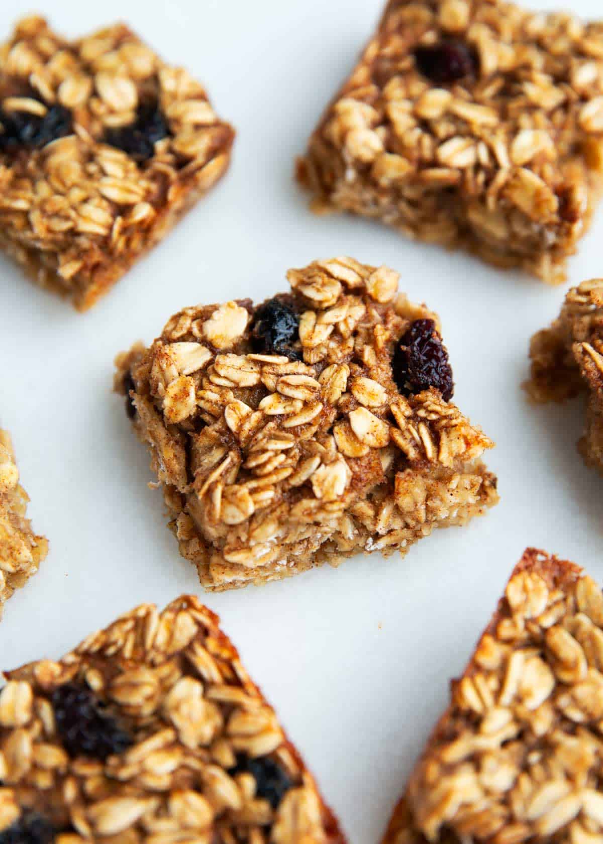 Oatmeal breakfast bars cut into pieces on the counter.