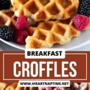 Croffles on a plate with berries and chocolate drizzle.