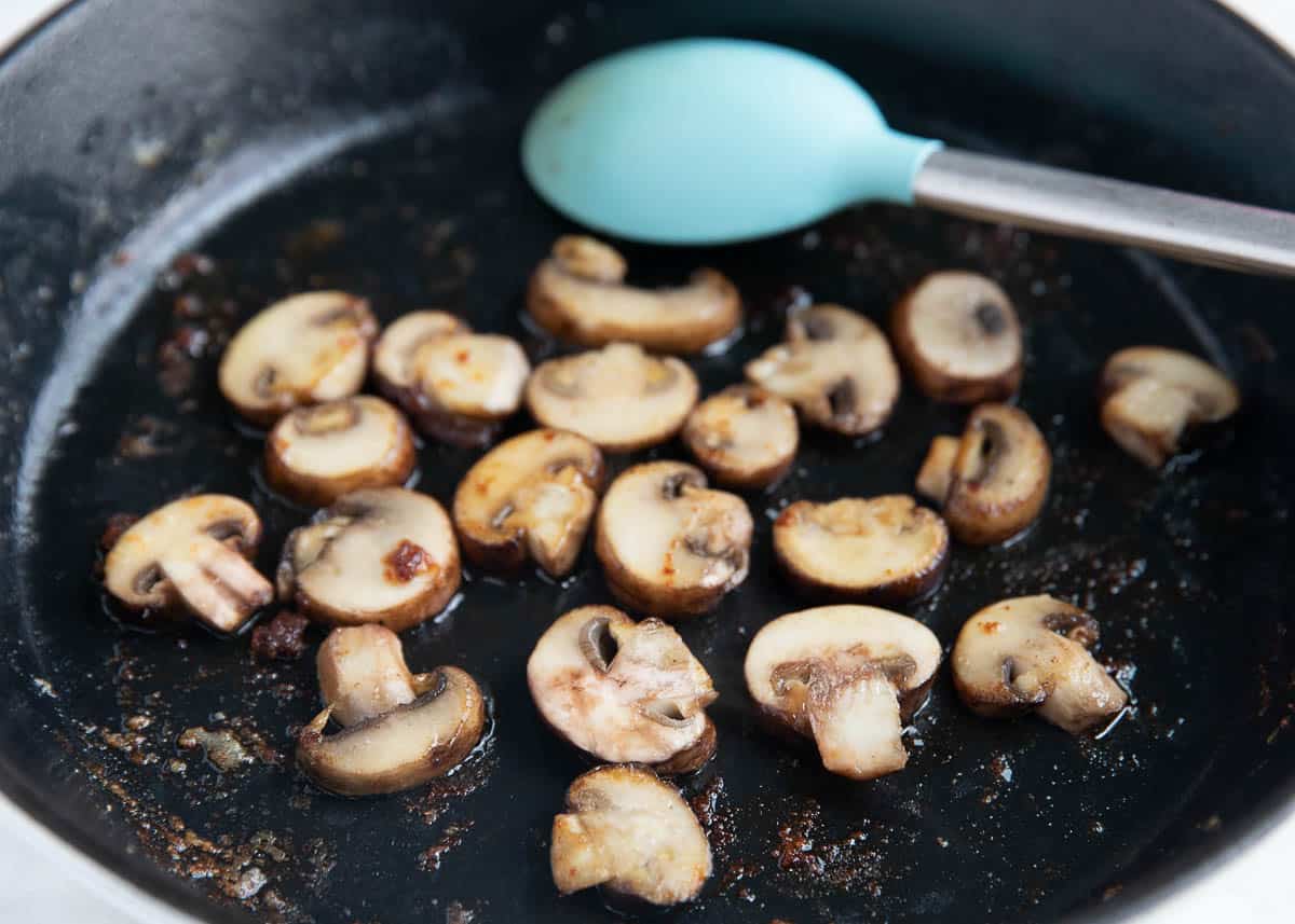 Mushroom sauteed in a pan.