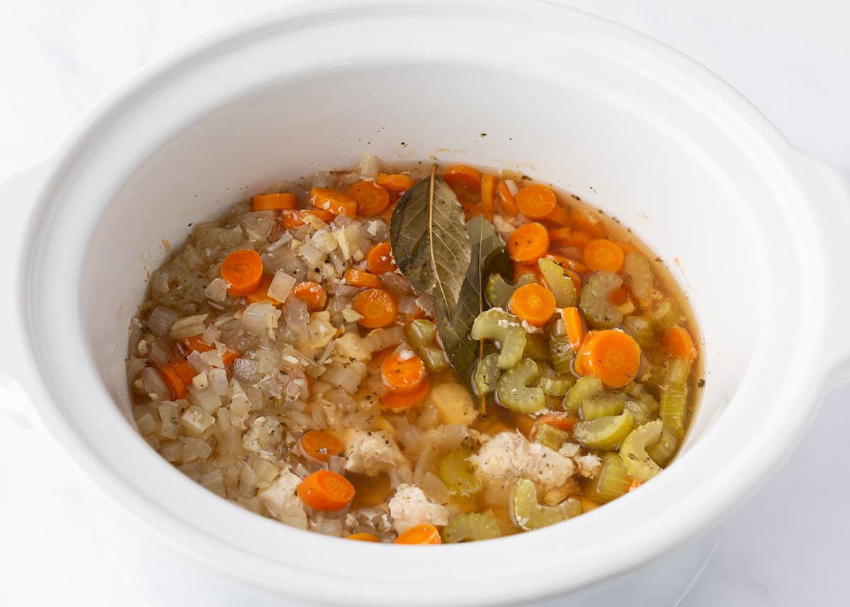 Cooked slow cooker chicken noodle soup.