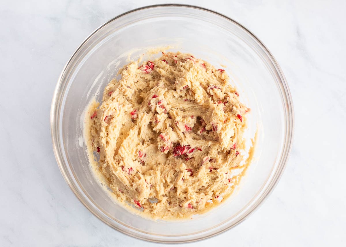 Strawberry cookie dough in a bowl.