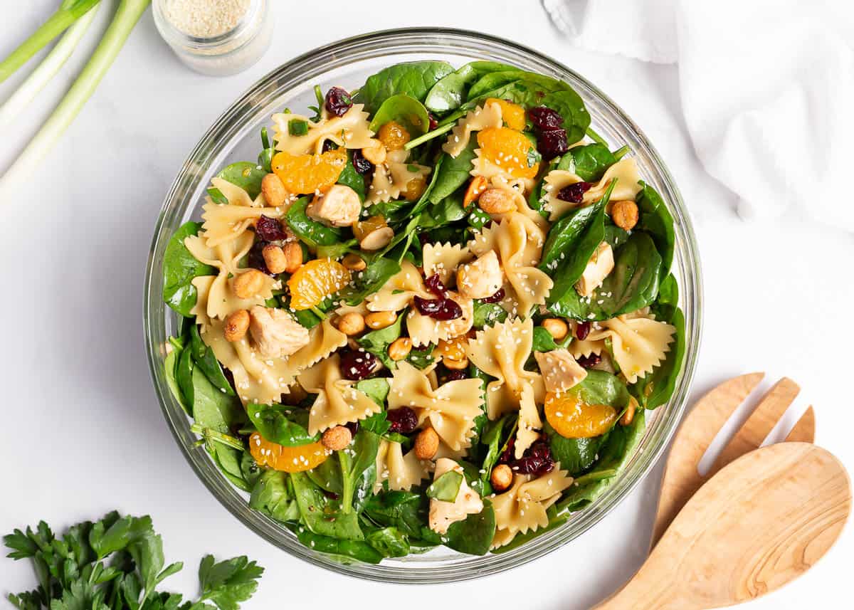 Spinach pasta salad in a bowl.