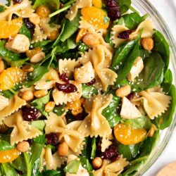 Spinach pasta salad in a bowl.