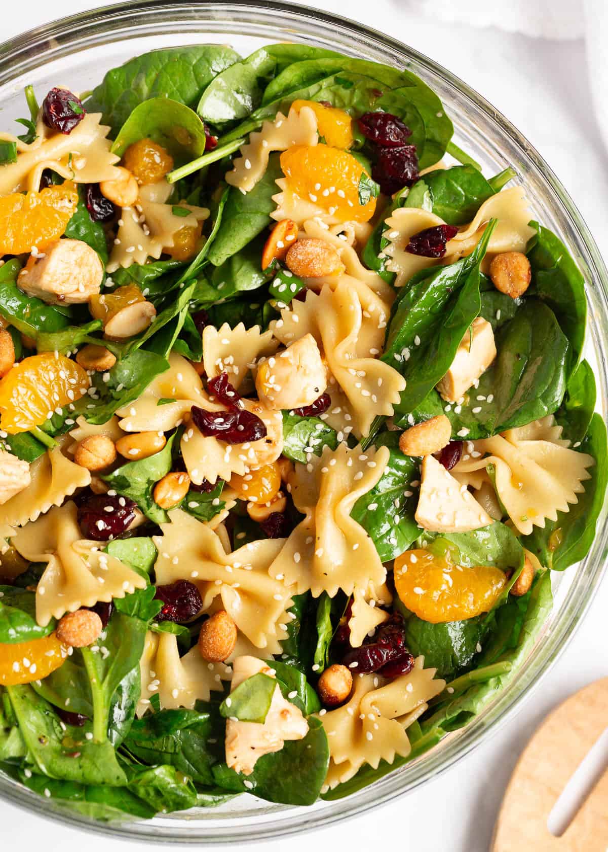 Spinach pasta salad in a bowl.