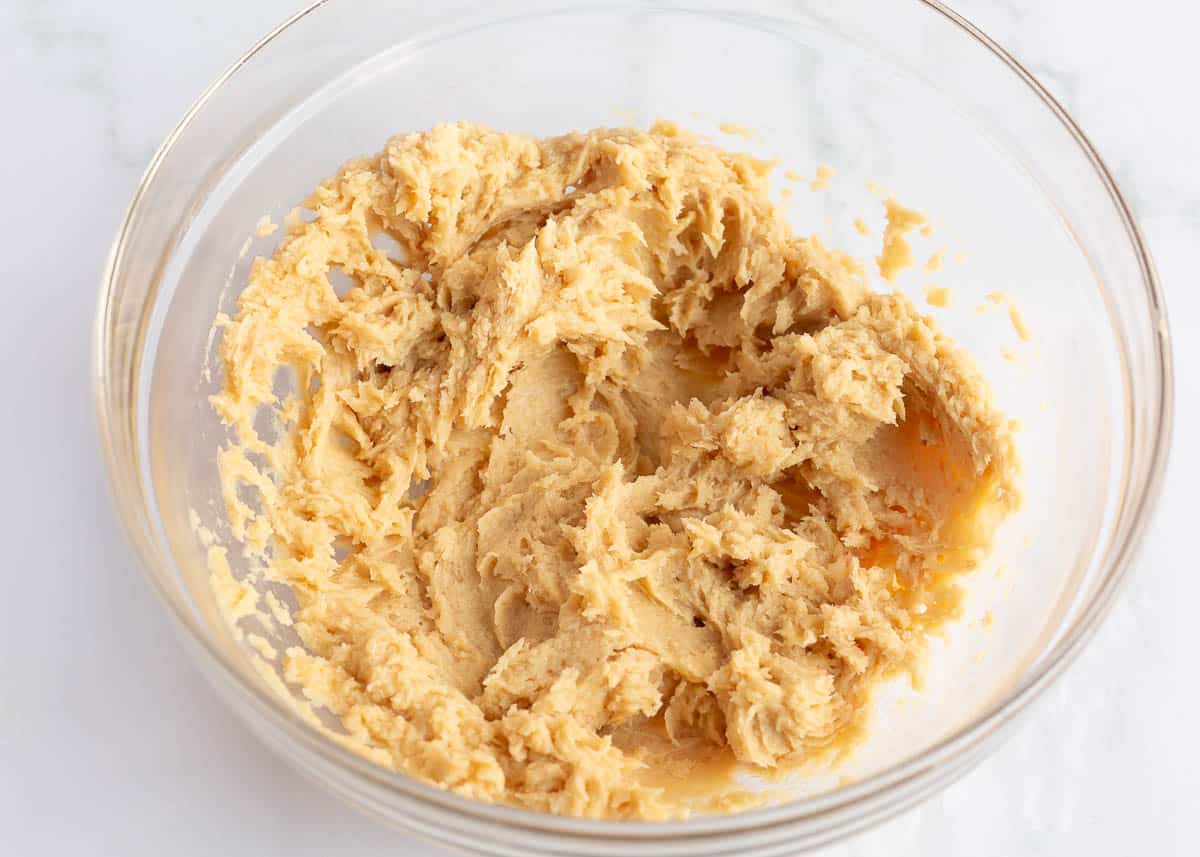 Cookie dough in clear bowl.