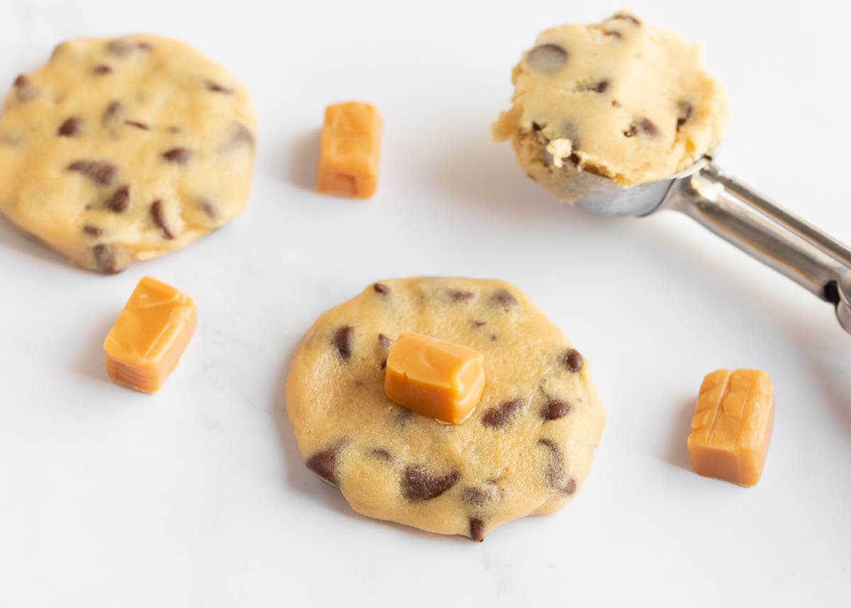 Making caramel chocolate chip cookies.