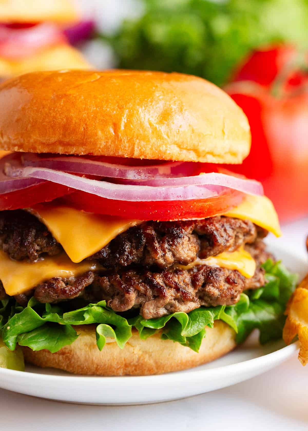 A smash burger on a plate.