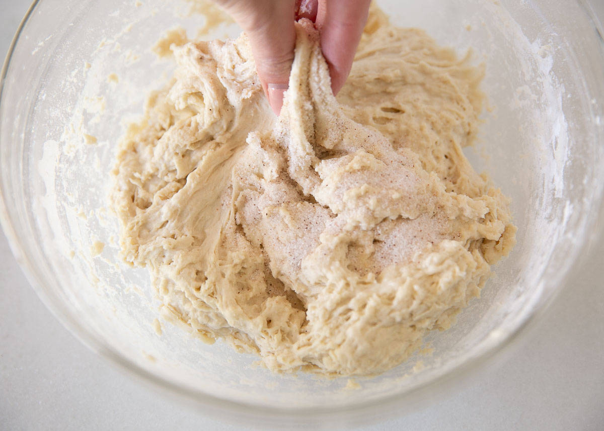 Mixing salt into sourdough. 