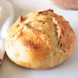 Sourdough bread loaf on counter.