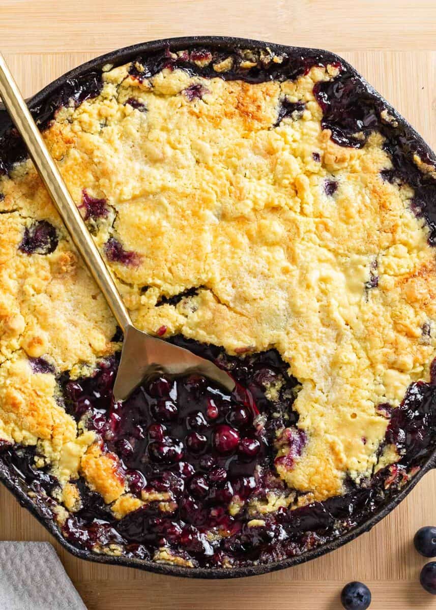 Blueberry dump cake in a skillet. 