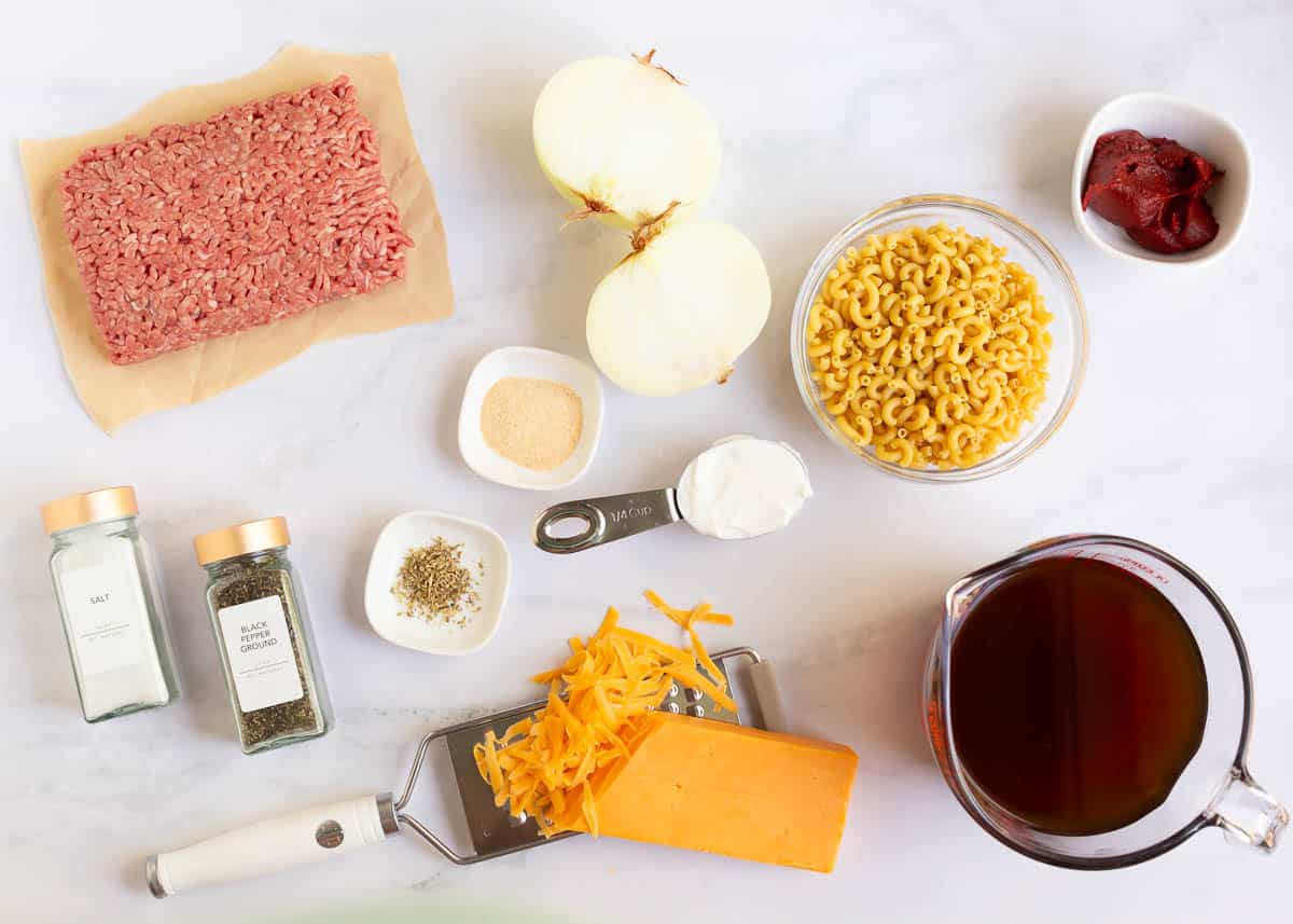 Ground beef, elbow macaroni, tomato paste, broth, cheese, onion, sour cream and seasonings.