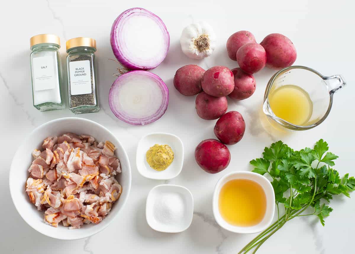 German potato salad ingredients on a counter.