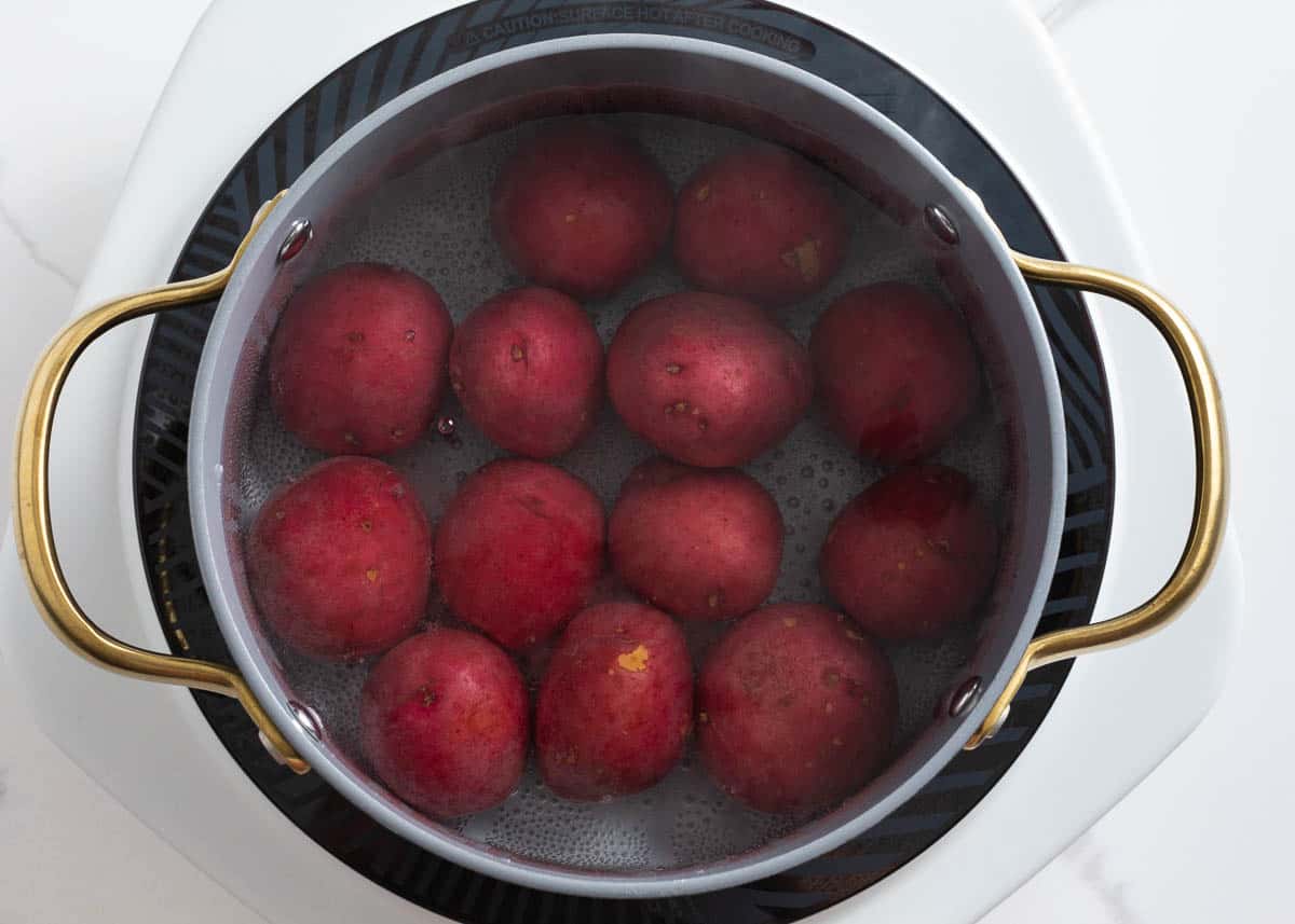 Red potatoes in a pot.