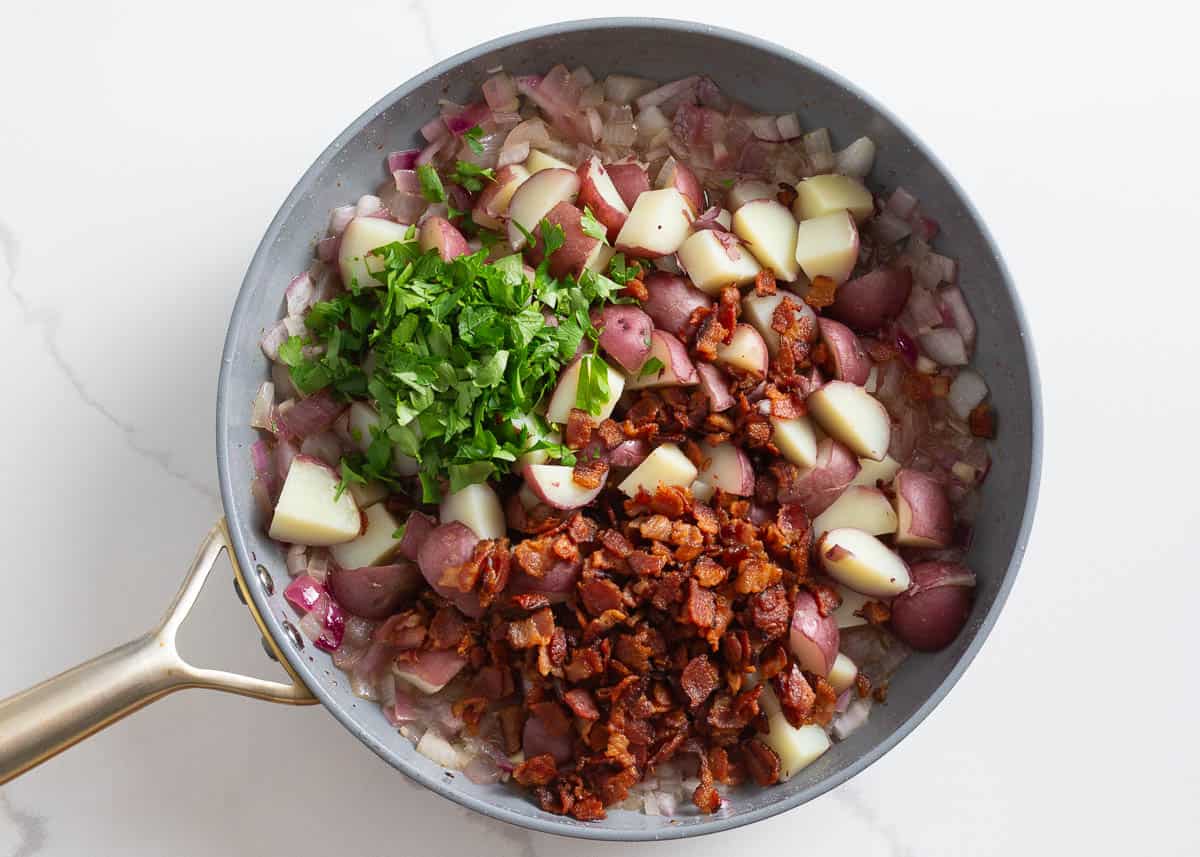 Bacon, potatoes, parsley and onion mixture in a large skillet.